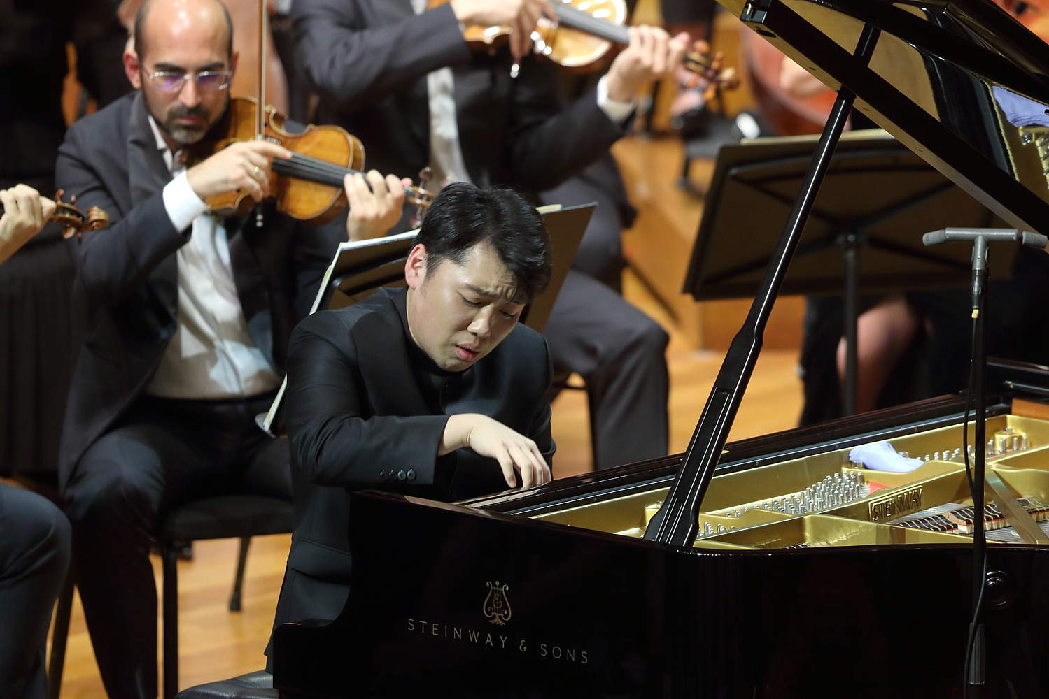 © Jeremy Xie The Orchestre de la Suisse Romande on tour at the National Center for the Performing Arts in Beijing with pianist George Li and conductor Jonathan Nott