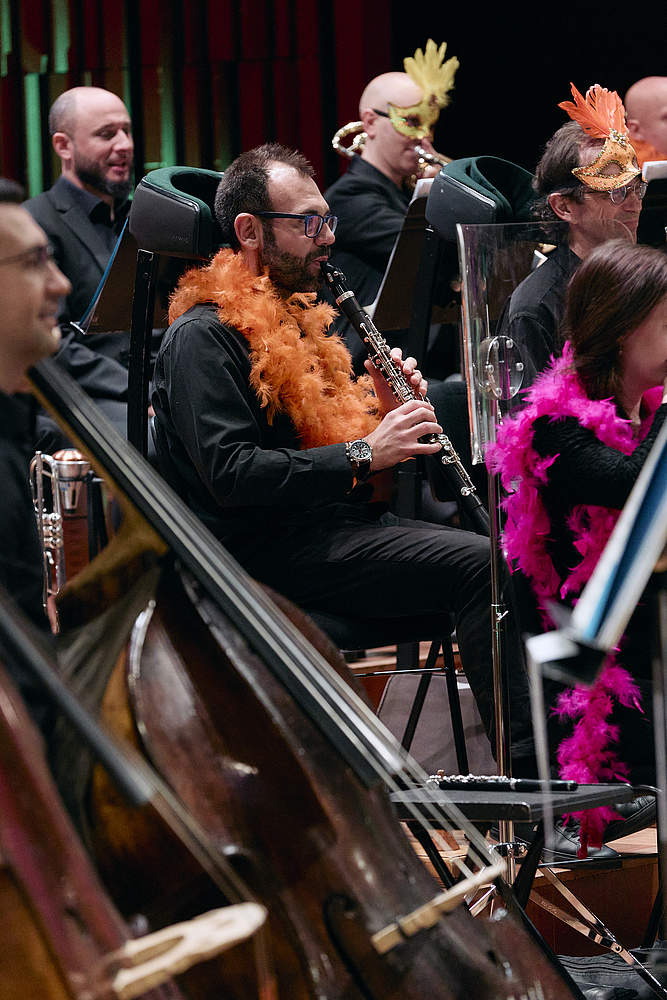 © Dougados Magali Camillo Battistello, clarinetist at the Orchestre de la Suisse Romande during the family concert “Le Carnaval d'Aldo” dressed with a carnival accessory on the stage of Geneva's Victoria Hall.